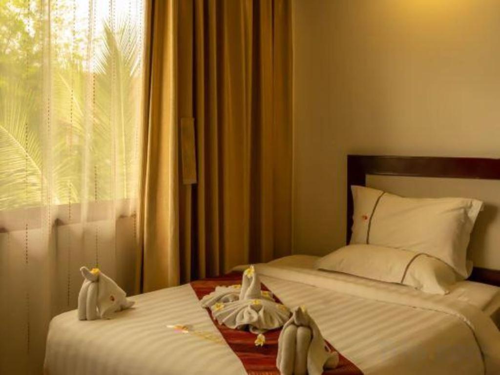 Xishuangbanna Hotel Managed By Xandria Hotel Luangprabang Kültér fotó