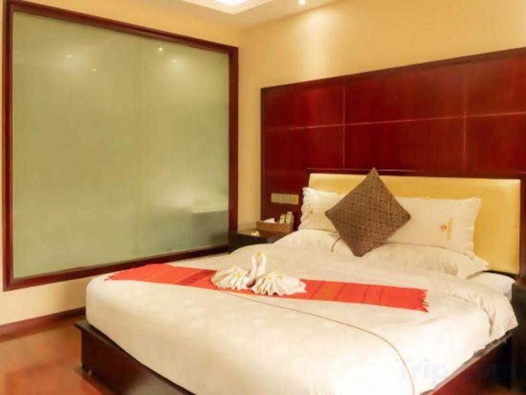 Xishuangbanna Hotel Managed By Xandria Hotel Luangprabang Kültér fotó