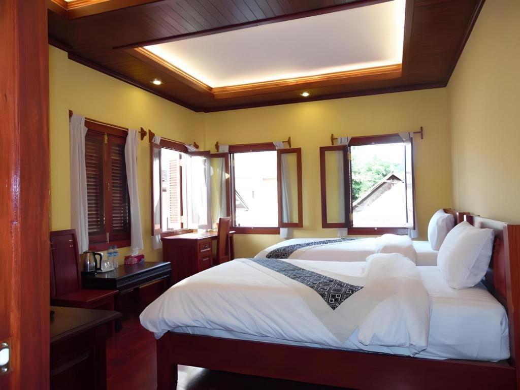 Xishuangbanna Hotel Managed By Xandria Hotel Luangprabang Kültér fotó