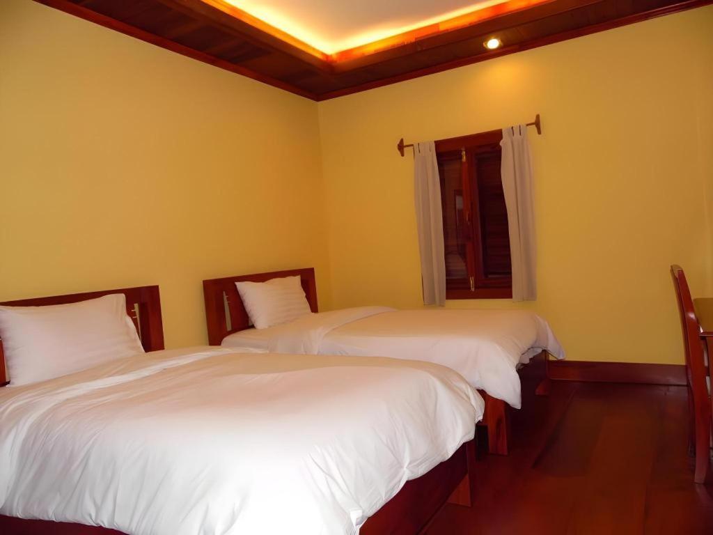 Xishuangbanna Hotel Managed By Xandria Hotel Luangprabang Kültér fotó
