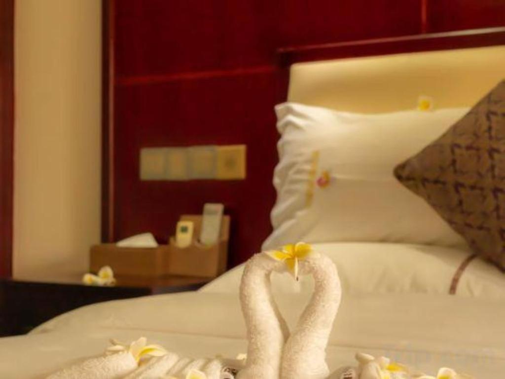 Xishuangbanna Hotel Managed By Xandria Hotel Luangprabang Kültér fotó