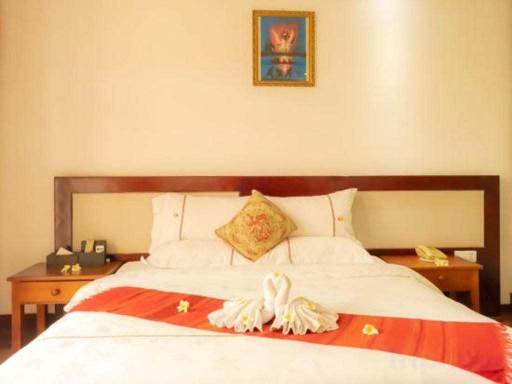Xishuangbanna Hotel Managed By Xandria Hotel Luangprabang Kültér fotó