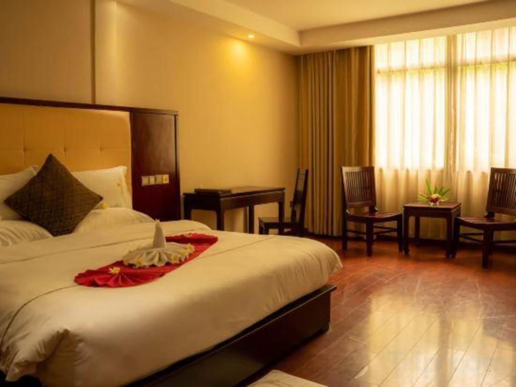 Xishuangbanna Hotel Managed By Xandria Hotel Luangprabang Kültér fotó