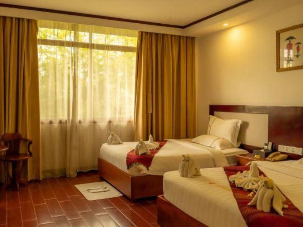 Xishuangbanna Hotel Managed By Xandria Hotel Luangprabang Kültér fotó